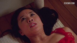 Sook-Yin Lee se masturba con un Consolador vibrante, escena en Shortbus