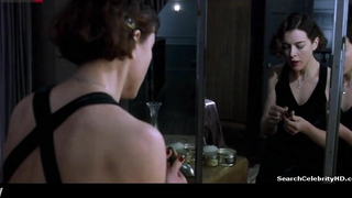 Olivia Williams sexy, escena en The Heart Me 2002