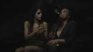 Escena erótica de Eva Mendes de Holy Motors (2012)